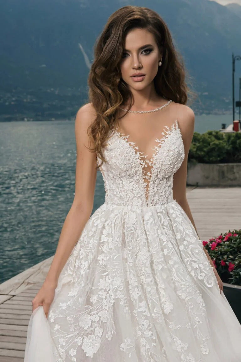 Timeless Ball Gown Wedding Dress with Elegant Straps, V-Neckline, and a Flattering Natural Waistline for a Breathtaking Bridal Appearance