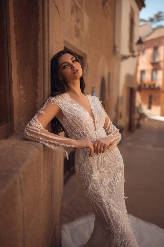 Glamorous Mermaid Wedding Gown with Sparkling Lace, Sequins, and a Flowing Tulle Train for a Breathtaking Bridal Entrance