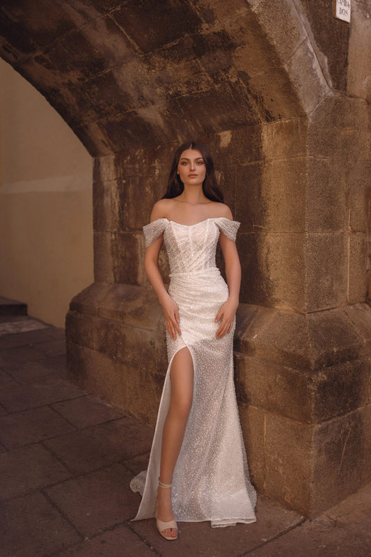 Fairy Tale-Inspired Mermaid Wedding Gown with Glittering Tulle for a Breathtakingly Elegant Bridal Look