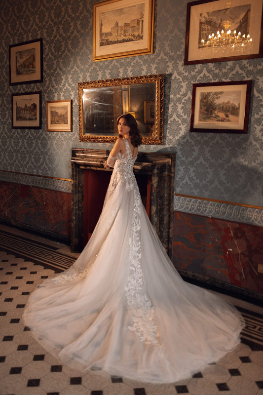 Enchanting A-Line Wedding Gown with Layers of Delicate Tulle, Lace, 3D Flowers, and Sequins for a Glamorous and Regal Bridal Look