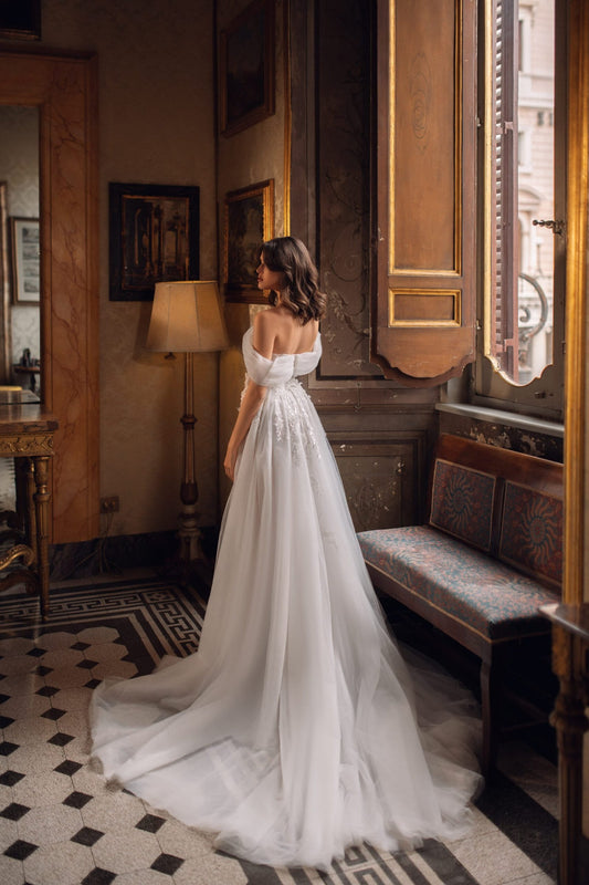 Timeless A-Line Wedding Gown with Delicate Lace, Sparkling Sequins, and Romantic Off-Shoulder Design for an Effortlessly Elegant Bridal Look