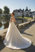 Modern A-Line Wedding Dress with Sweetheart Neckline, Cap Sleeves, Lace Appliques, and Sweep Train for a Romantic Bridal Look