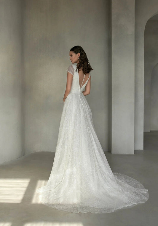 Romantic A-Line Bridal Gown with Cap Sleeves, V-Neckline, and Elegant Button Embellishments for a Stunning Look