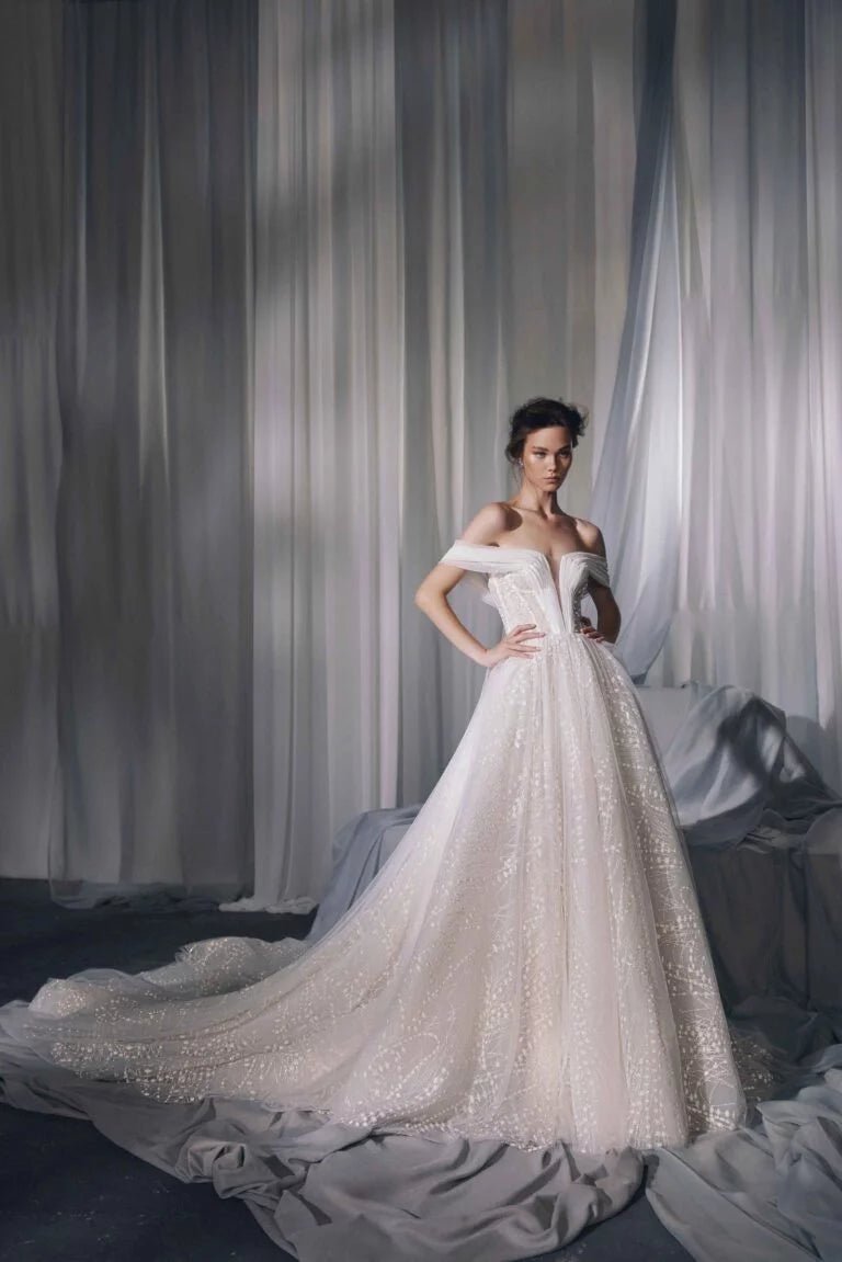 Romantic A-Line Puffy Wedding Gown with Puff Sleeves, Boat Neckline, Lace Embellishments, and Natural Waistline for a Stunning Look