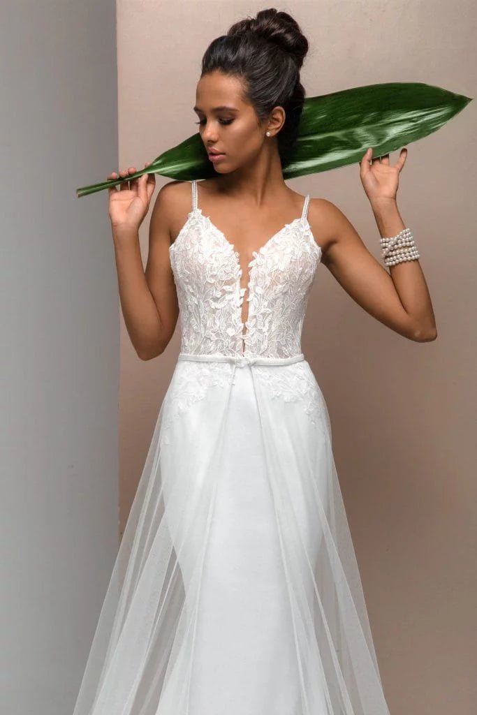 Romantic Mermaid Wedding Dress with Straps, V-Neckline, and Lace Embellishments for a Stunning Bridal Look