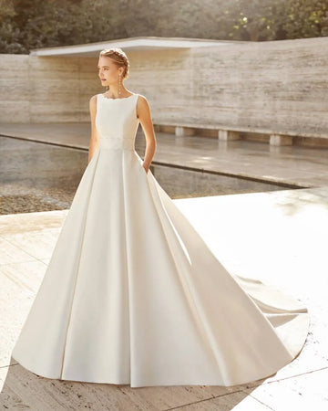 Graceful A-Line Wedding Dress with Delicate Spaghetti Straps, Elegant Boat Neckline, and a Flattering Natural Waistline for a Timeless Bridal Look