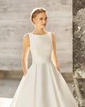 Graceful A-Line Wedding Dress with Delicate Spaghetti Straps, Elegant Boat Neckline, and a Flattering Natural Waistline for a Timeless Bridal Look