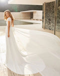 Timeless A-Line Wedding Gown with Exquisite Lace Detailing, Graceful Cap Sleeves, and a Sophisticated Boat Neckline for an Elegant and Romantic Bridal Look