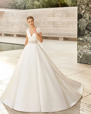 Romantic A-Line Wedding Gown with Delicate Lace Detailing, Elegant Cap Sleeves, and a Flattering V-Neckline for a Timeless and Graceful Bridal Look