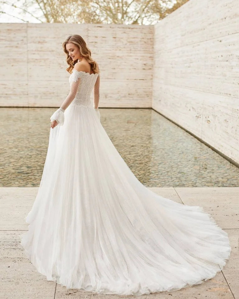 Romantic A-Line Wedding Dress with Elegant Long Sleeves, Off-Shoulder Neckline, and a Flattering Natural Waistline for a Breathtaking Bridal Look