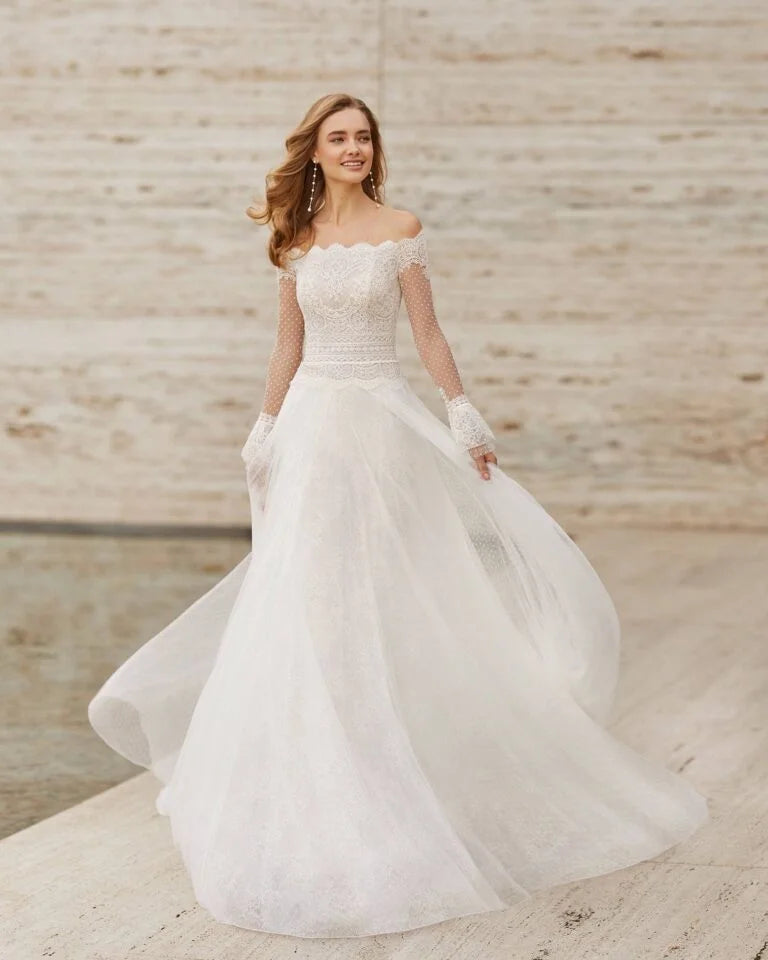 Romantic A-Line Wedding Dress with Elegant Long Sleeves, Off-Shoulder Neckline, and a Flattering Natural Waistline for a Breathtaking Bridal Look