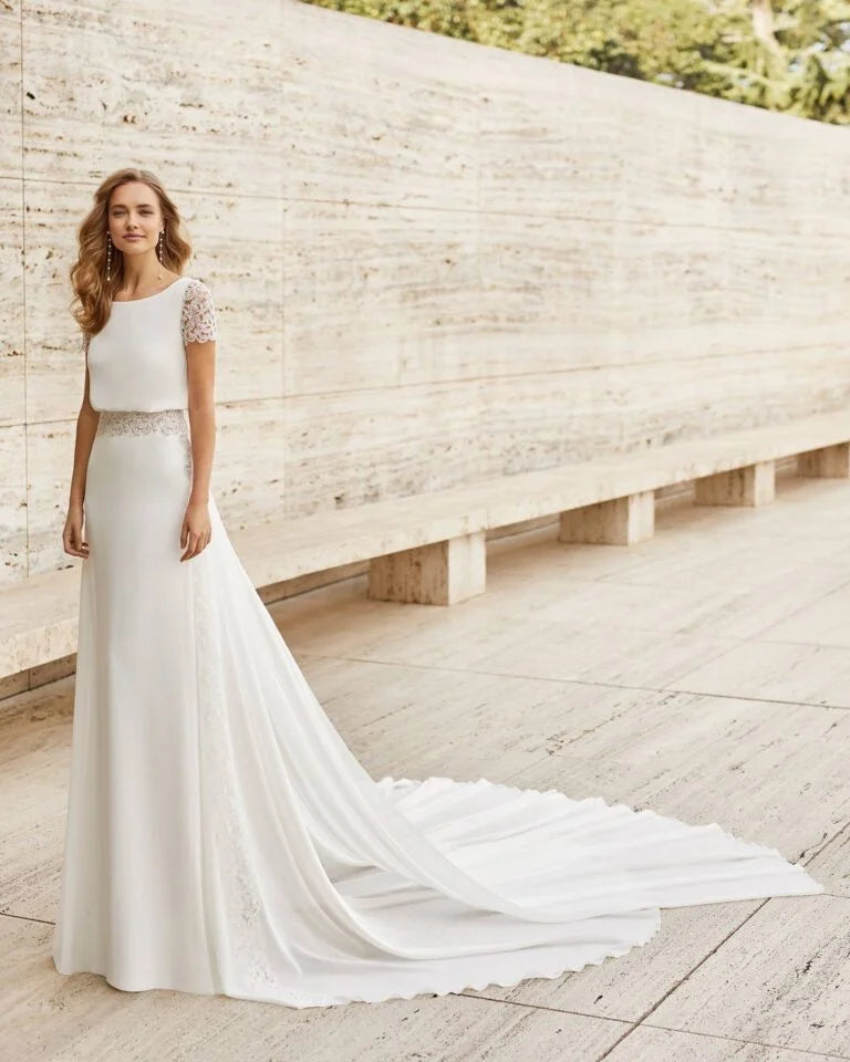 Sophisticated Sheath Wedding Dress with Elegant Long Sleeves, Boat Neckline, and a Flattering Natural Waistline for a Timeless Bridal Look