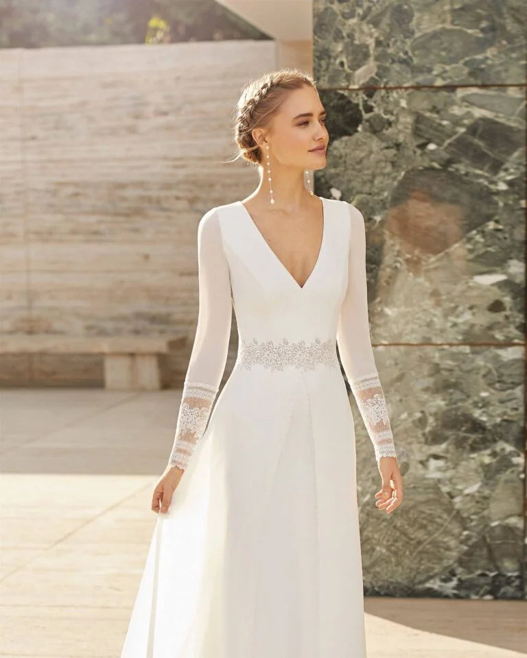 Elegant A-Line Wedding Gown with Exquisite Lace Detailing, Graceful Long Sleeves, and a Flattering V-Neckline for a Timeless and Sophisticated Bridal Look