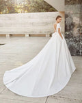 Timeless A-Line Wedding Gown with Exquisite Lace Detailing, Elegant Cap Sleeves, and a Sophisticated Boat Neckline for a Graceful and Romantic Bridal Look