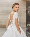 Timeless A-Line Wedding Gown with Exquisite Lace Detailing, Elegant Cap Sleeves, and a Sophisticated Boat Neckline for a Graceful and Romantic Bridal Look