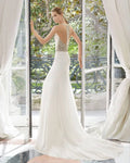 Timeless Strapless Sheath Wedding Gown with a Chic Jewel Neckline and Elegant Lace Detailing for a Graceful Bridal Look