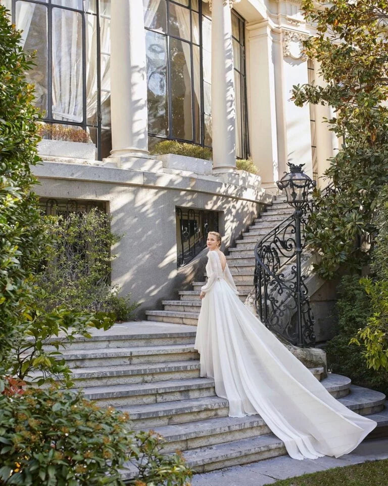 Elegant Sheath Wedding Gown with Delicate Lace Detailing, Graceful Long Sleeves, and a Flattering Scoop Neckline for a Timeless and Romantic Bridal Look