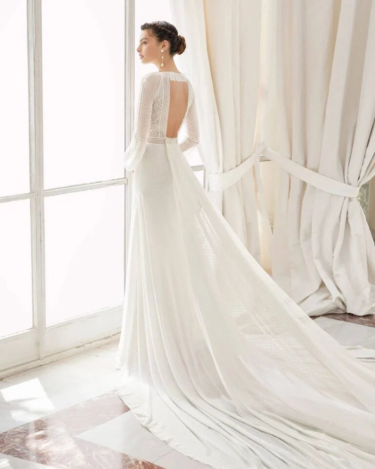 Graceful Sheath Wedding Gown with Exquisite Lace Detailing, Elegant Long Sleeves, and a Flattering V-Neckline for a Timeless and Sophisticated Bridal Look