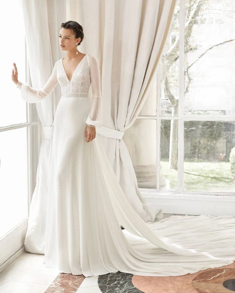 Graceful Sheath Wedding Gown with Exquisite Lace Detailing, Elegant Long Sleeves, and a Flattering V-Neckline for a Timeless and Sophisticated Bridal Look