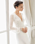 Graceful Sheath Wedding Gown with Exquisite Lace Detailing, Elegant Long Sleeves, and a Flattering V-Neckline for a Timeless and Sophisticated Bridal Look