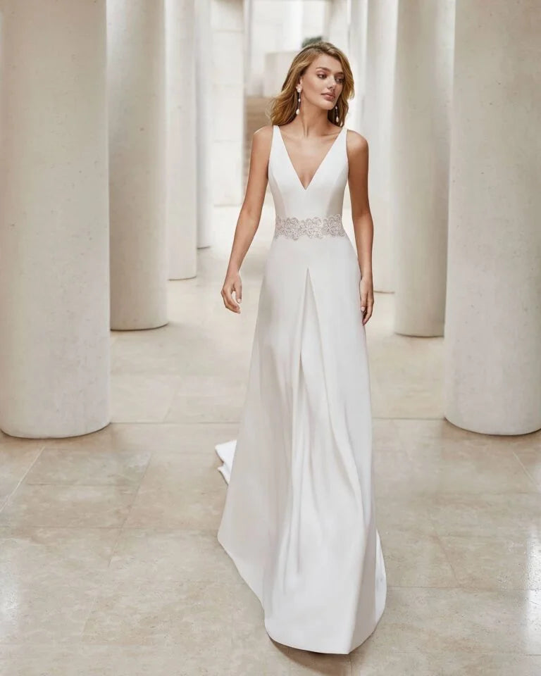 Elegant Sheath Wedding Gown with Delicate Lace Detailing, Dainty Spaghetti Straps, and a Flattering V-Neckline for a Romantic and Timeless Bridal Look