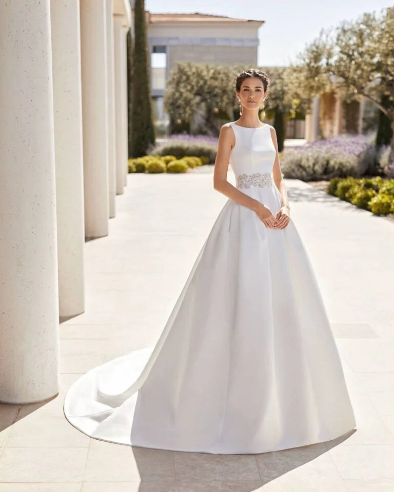 Elegant A-Line Wedding Gown with Exquisite Lace Detailing, a Chic Strapless Design, and a Sophisticated High Neckline for a Timeless and Graceful Bridal Look