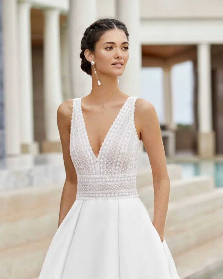 Romantic A-Line Wedding Gown with Delicate Lace Detailing, Elegant Spaghetti Straps, and a Flattering V-Neckline for a Timeless and Breathtaking Bridal Look