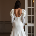 Sexy White Mermaid Wedding Gown with a High Slit for a Bold, Edgy Look
