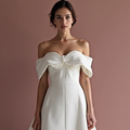 Unique White Princess Bridal Gown with Cascading Ruffles and a Dramatic Silhouette
