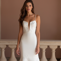 Timeless White Mermaid Wedding Gown with an Elegant Lace Overlay for a Vintage Feel