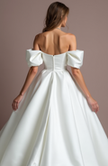 Elegant White Princess Wedding Dress with an Illusion Neckline and Sparkling Details