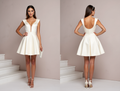 Playful White Mini Short Wedding Dress with a Puff Sleeve for a Fun and Vintage-Inspired Look