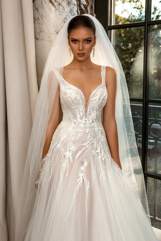 Ethereal A-Line Wedding Gown with Delicate Spaghetti Straps, a Flattering V-Neckline, and a Graceful Natural Waistline for a Romantic and Timeless Bridal Look