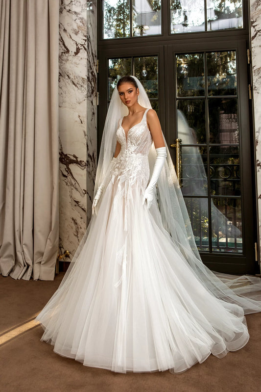 Ethereal A-Line Wedding Gown with Delicate Spaghetti Straps, a Flattering V-Neckline, and a Graceful Natural Waistline for a Romantic and Timeless Bridal Look