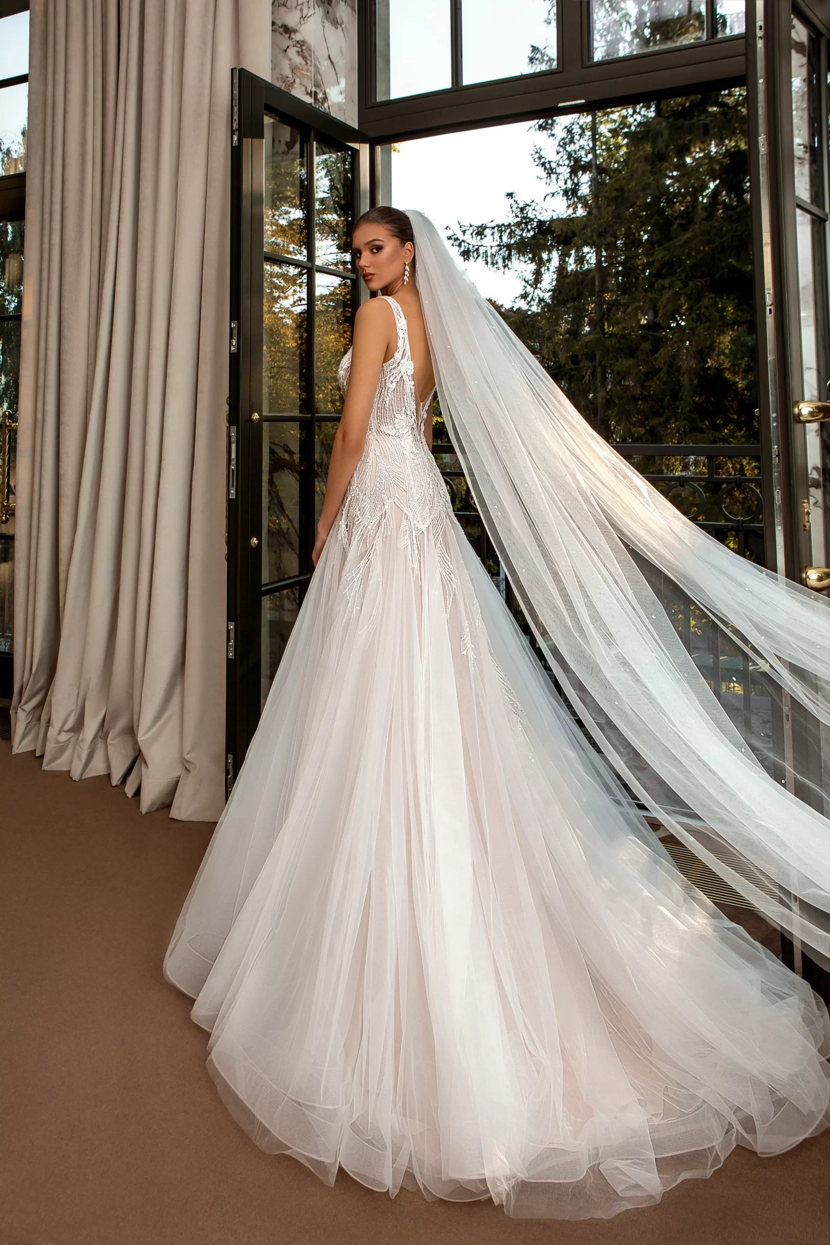 Ethereal A-Line Wedding Gown with Delicate Spaghetti Straps, a Flattering V-Neckline, and a Graceful Natural Waistline for a Romantic and Timeless Bridal Look