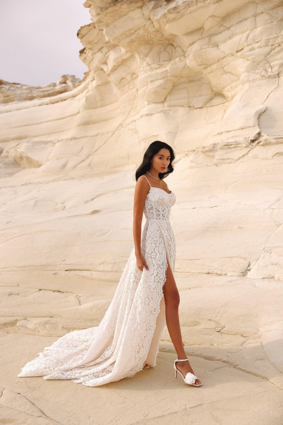 Beautiful Spaghetti Straps Wedding Dress with Lace Embellishments and a Sophisticated Slit Perfect for Brides Dresses