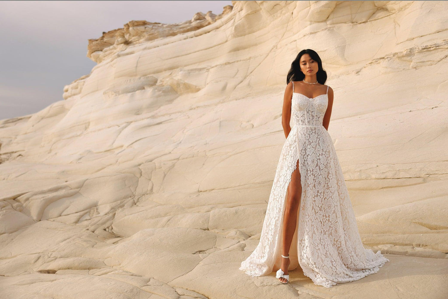 Beautiful Spaghetti Straps Wedding Dress with Lace Embellishments and a Sophisticated Slit Perfect for Brides Dresses