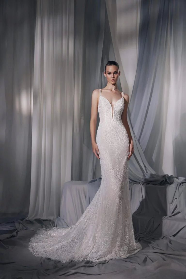 Sultry A-Line Bridal Gown with Strapless Design, V-Neckline, Lace Embellishments, and Natural Waistline for a Stunning Look