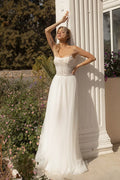 Elegant A-Line Wedding Gown with Delicate Straps, a Classic Boat Neckline, and a Flattering Natural Waistline for a Timeless and Graceful Bridal Look