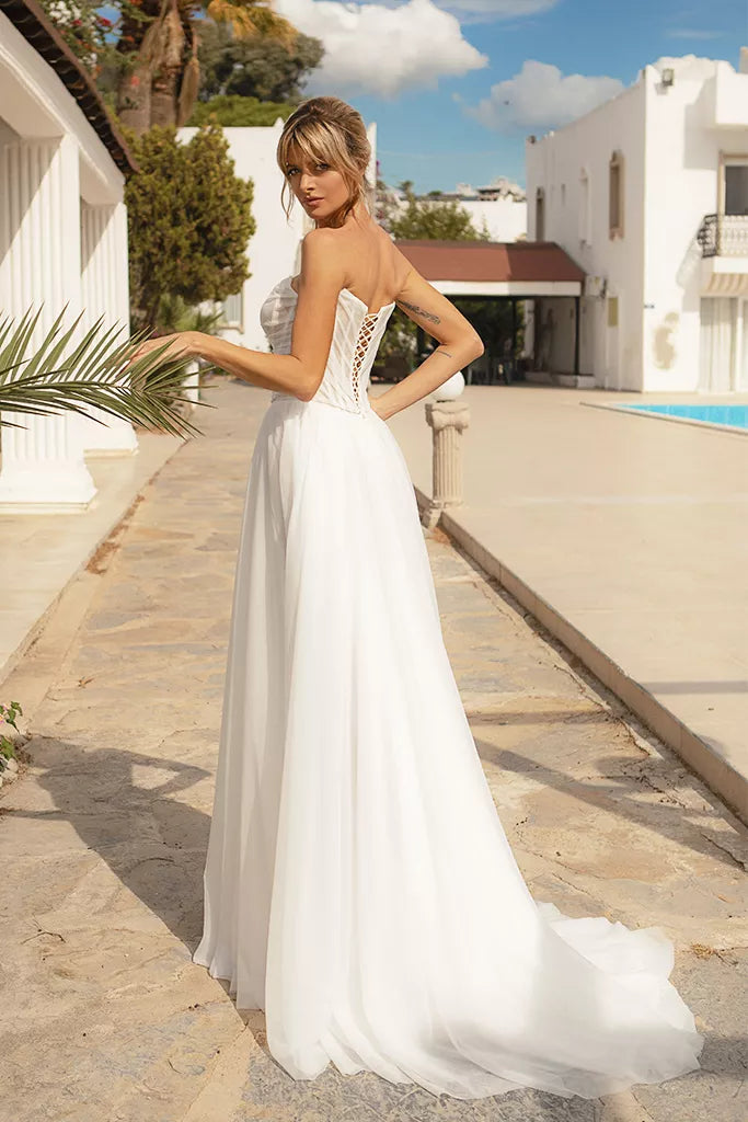 Elegant A-Line Wedding Gown with Delicate Straps, a Classic Boat Neckline, and a Flattering Natural Waistline for a Timeless and Graceful Bridal Look