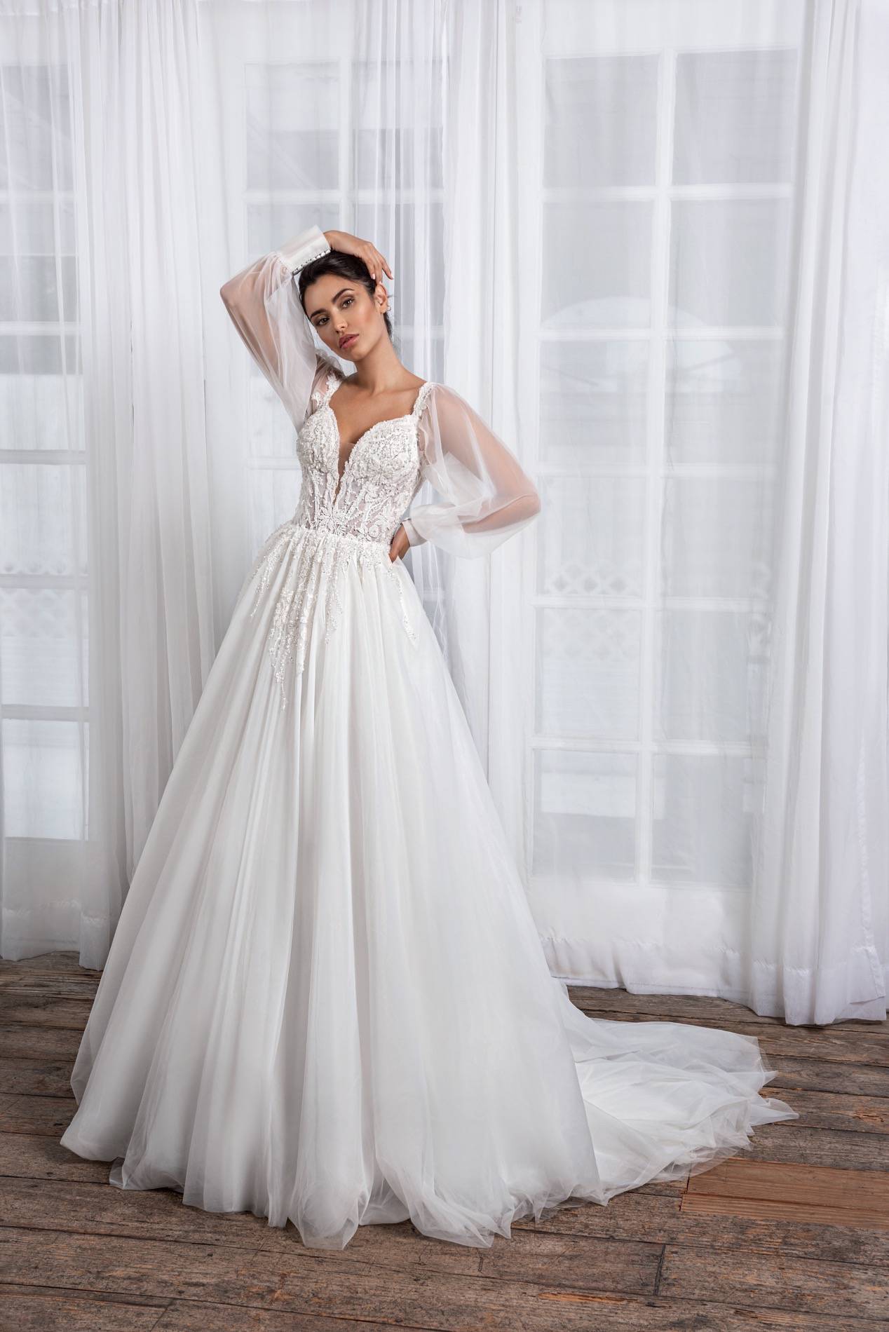 Elegant Long-Sleeve A-Line Wedding Dress with V-Neckline & Flattering Natural Waistline