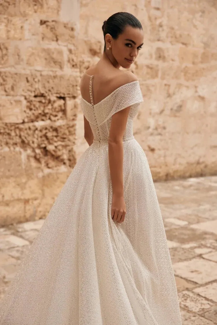 Vintage A-Line Wedding Gown – Strappy Illusion Neckline with Sequin Embellishments and a Natural Waistline for a Timeless Bridal Look