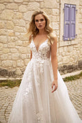 Ethereal A-Line Wedding Gown with Delicate Spaghetti Straps, a Flattering V-Neckline for a Romantic and Timeless Bridal Look