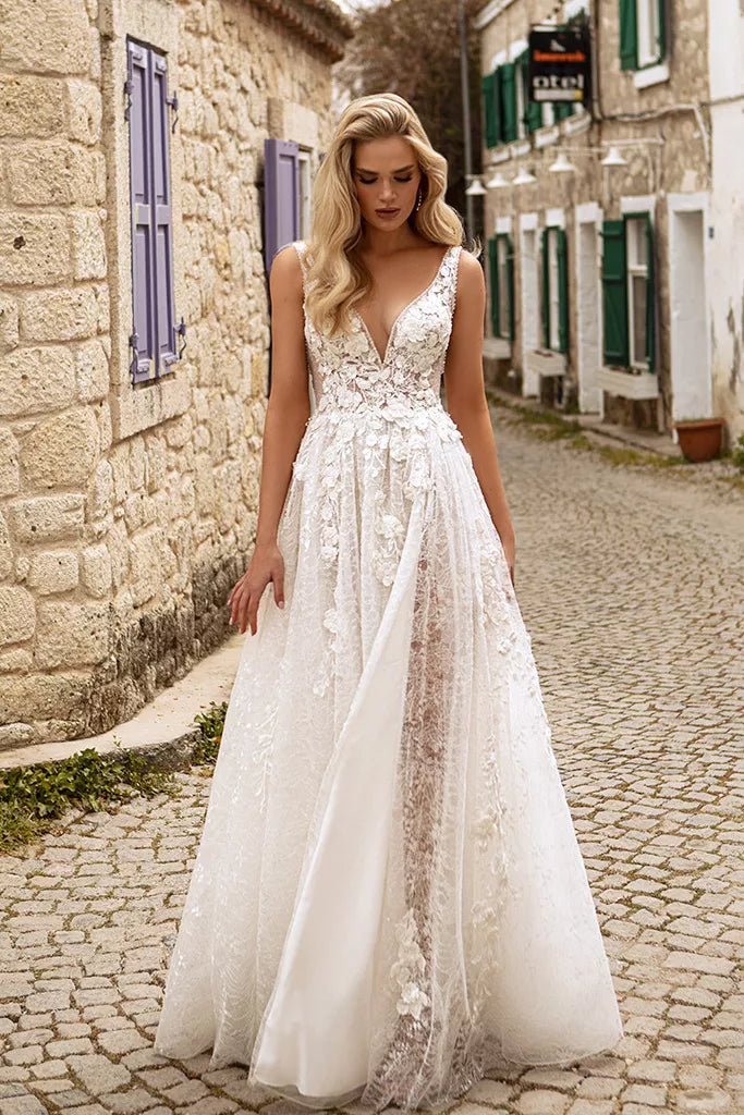 Ethereal A-Line Wedding Gown with Delicate Spaghetti Straps, a Flattering V-Neckline for a Romantic and Timeless Bridal Look