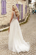 Ethereal A-Line Wedding Gown with Delicate Spaghetti Straps, a Flattering V-Neckline for a Romantic and Timeless Bridal Look