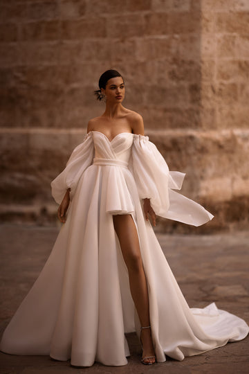 Elevate your bridal look with our enchanting A-line wedding dress, a harmonious blend of elegance and modernity.